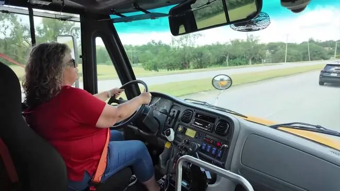Orange County Public Schools bus parked while the district recruits drivers and mechanics